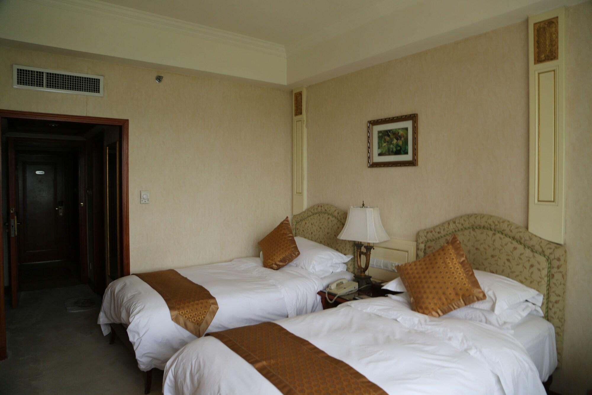Huiquan Dynasty Hotel Qingdao Esterno foto