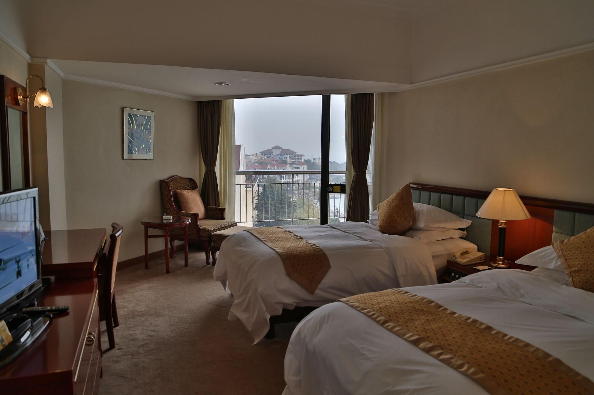 Huiquan Dynasty Hotel Qingdao Esterno foto