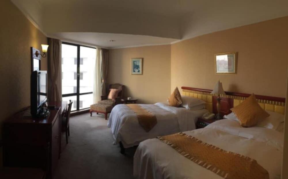 Huiquan Dynasty Hotel Qingdao Esterno foto