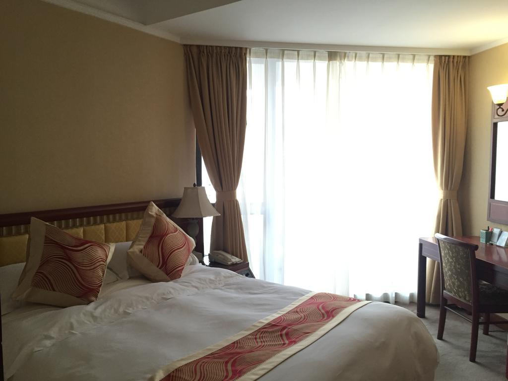 Huiquan Dynasty Hotel Qingdao Esterno foto