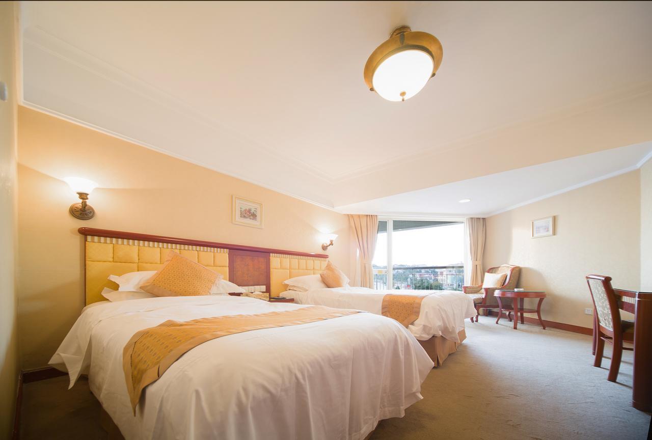 Huiquan Dynasty Hotel Qingdao Esterno foto