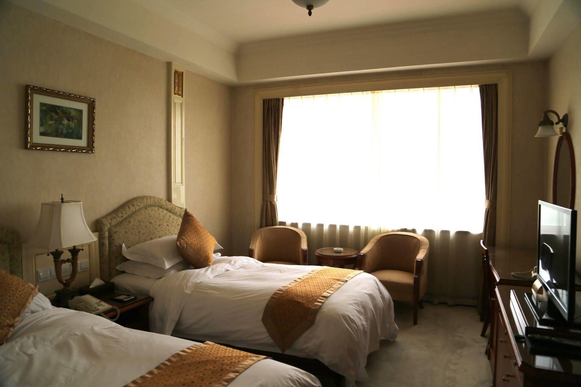 Huiquan Dynasty Hotel Qingdao Esterno foto