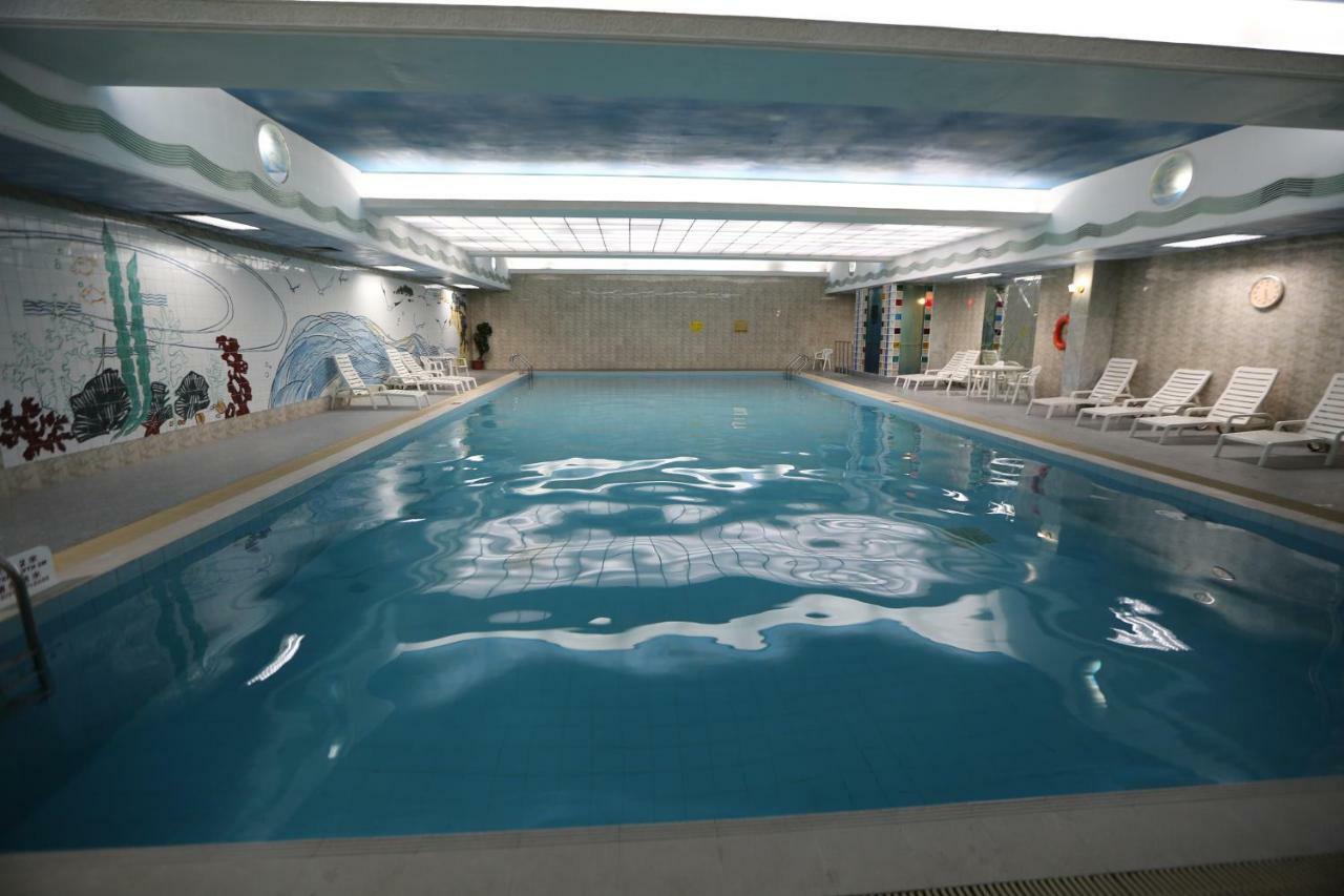 Huiquan Dynasty Hotel Qingdao Esterno foto