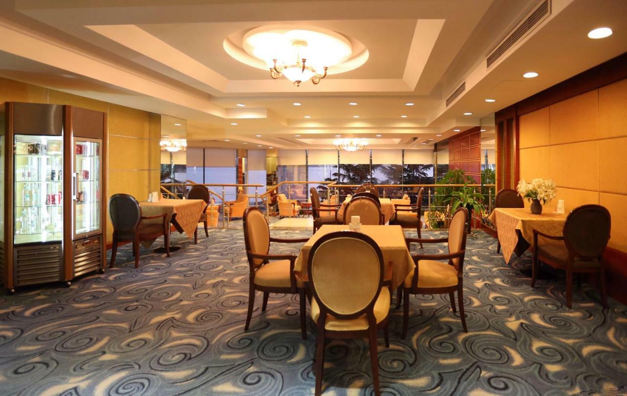 Huiquan Dynasty Hotel Qingdao Esterno foto